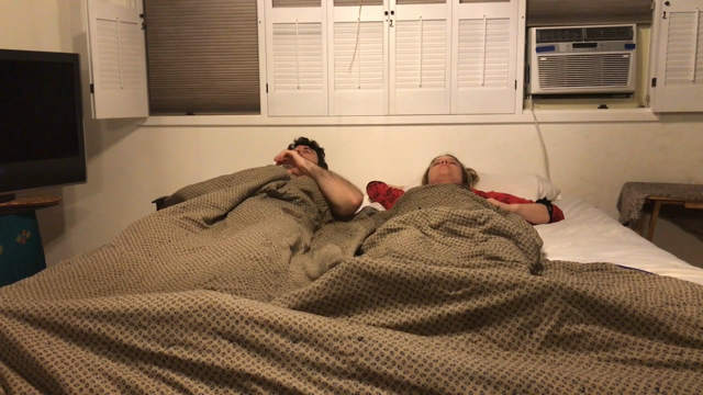 Stepmom shares bed with stepson.